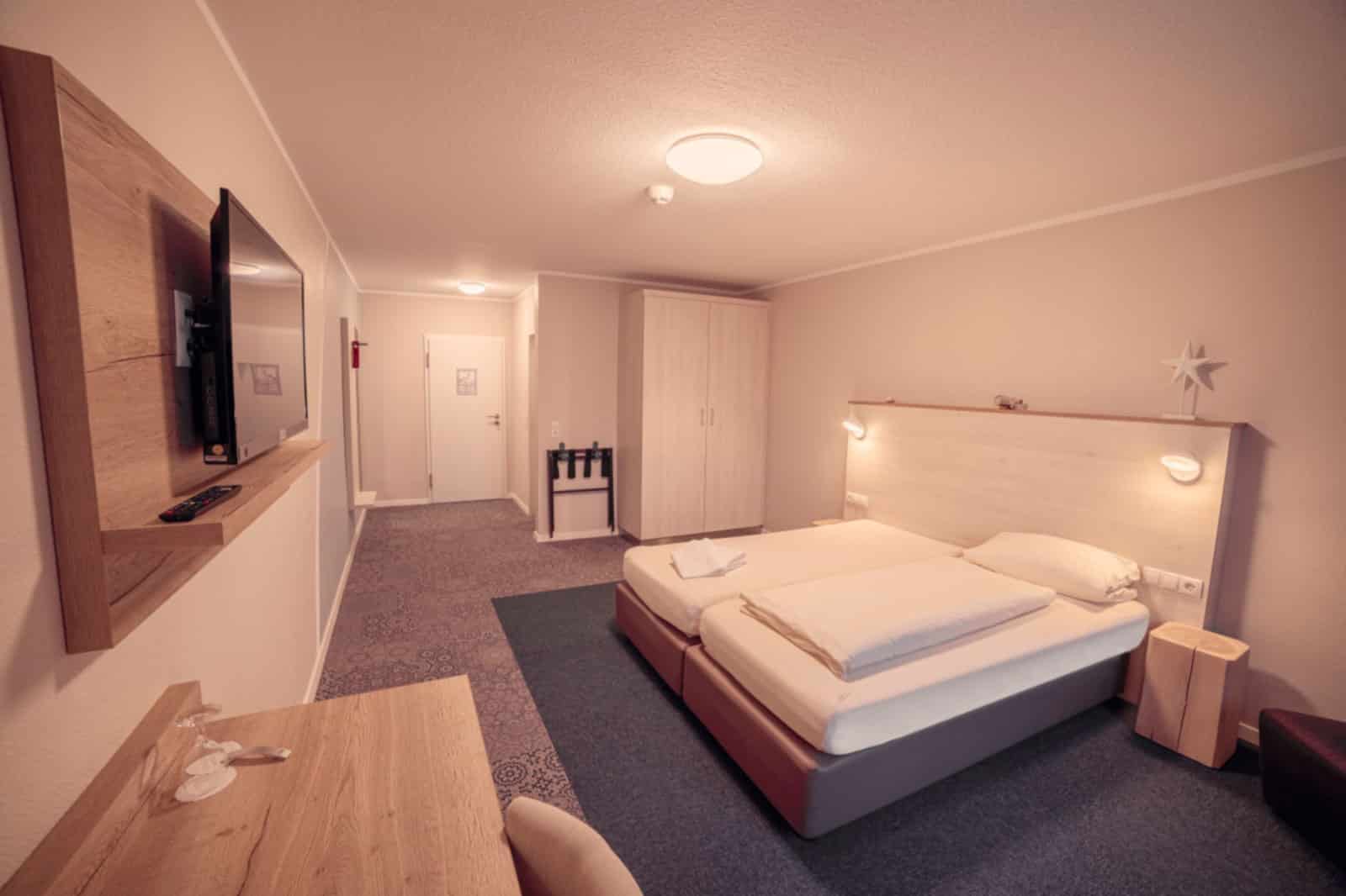 Zimmer im Eventhotel Moment, Sande