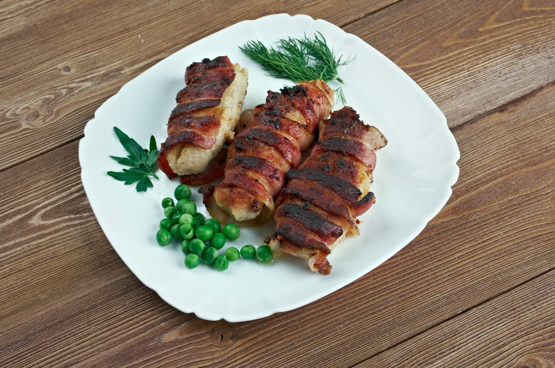 Slavink Slavink- Dutch meat dish.consisting of ground meat called half beef, half pork wrapped in bacon
